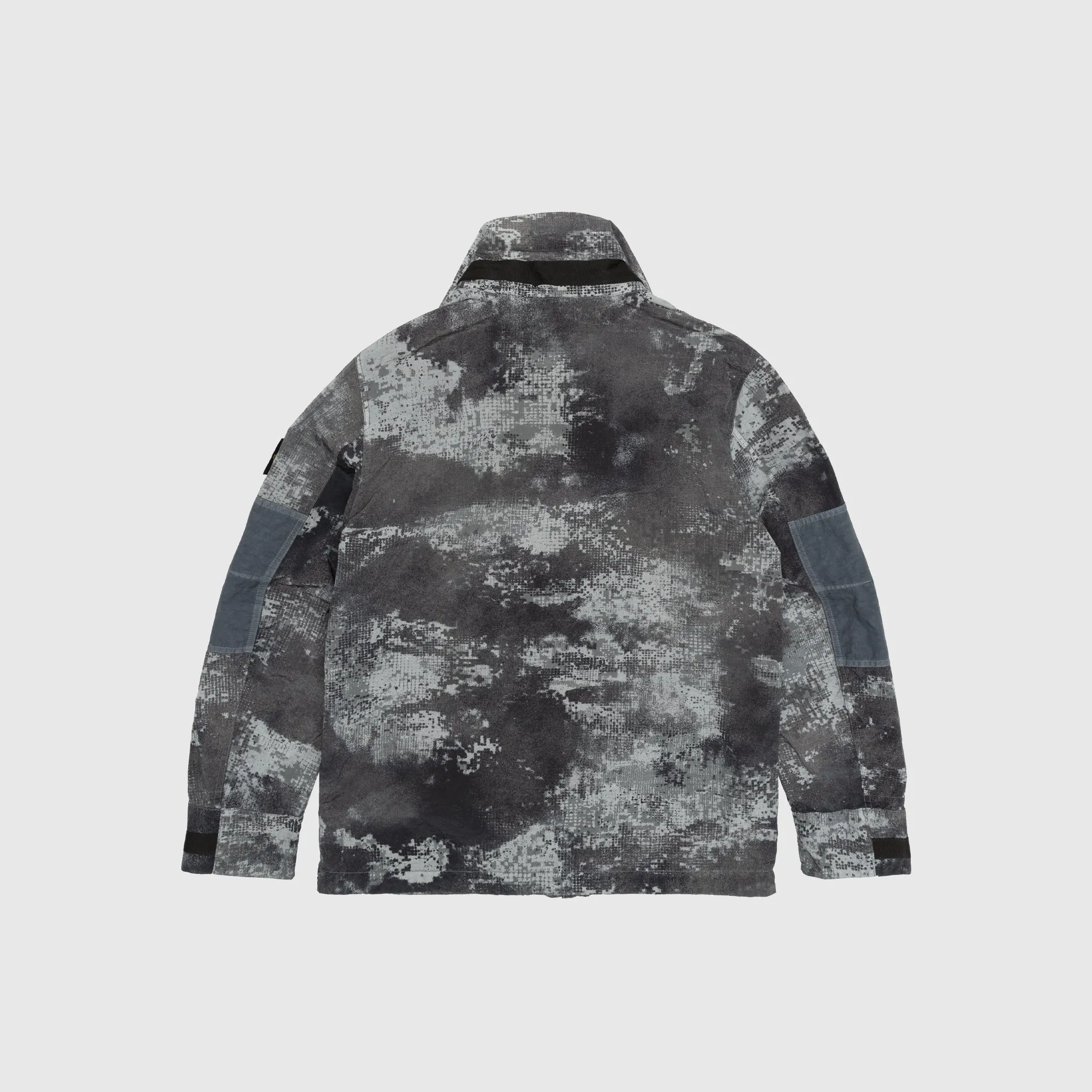 DISSOLVING GRID CAMO IN ECONYL® REGENERATED NYLON JACKET